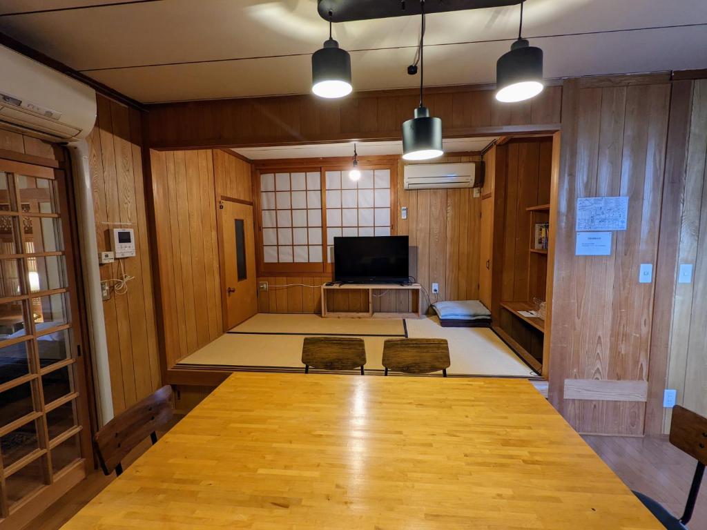 TV a/nebo společenská místnost v ubytování Yuzan apartment Sanjo