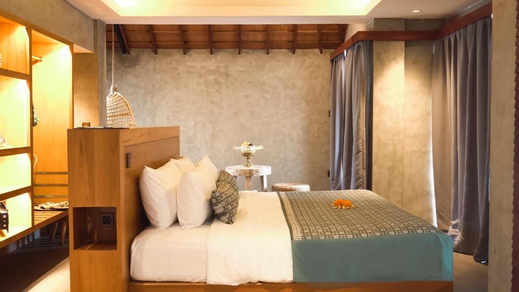 Postel nebo postele na pokoji v ubytování Annora Villas Seminyak
