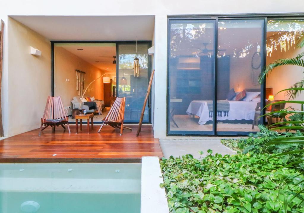 Bazén v ubytování Departamento 2 recamaras con alberca privada a 10 minutos de la playa nebo v jeho okolí