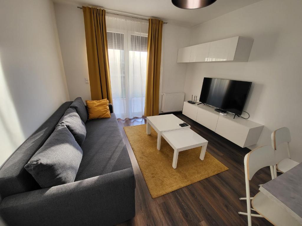 TV a/nebo společenská místnost v ubytování SDP Marina Apartment