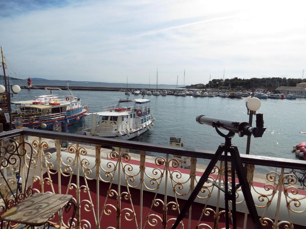 a view of a marina with boats in the water at Seaside apartment in Krk