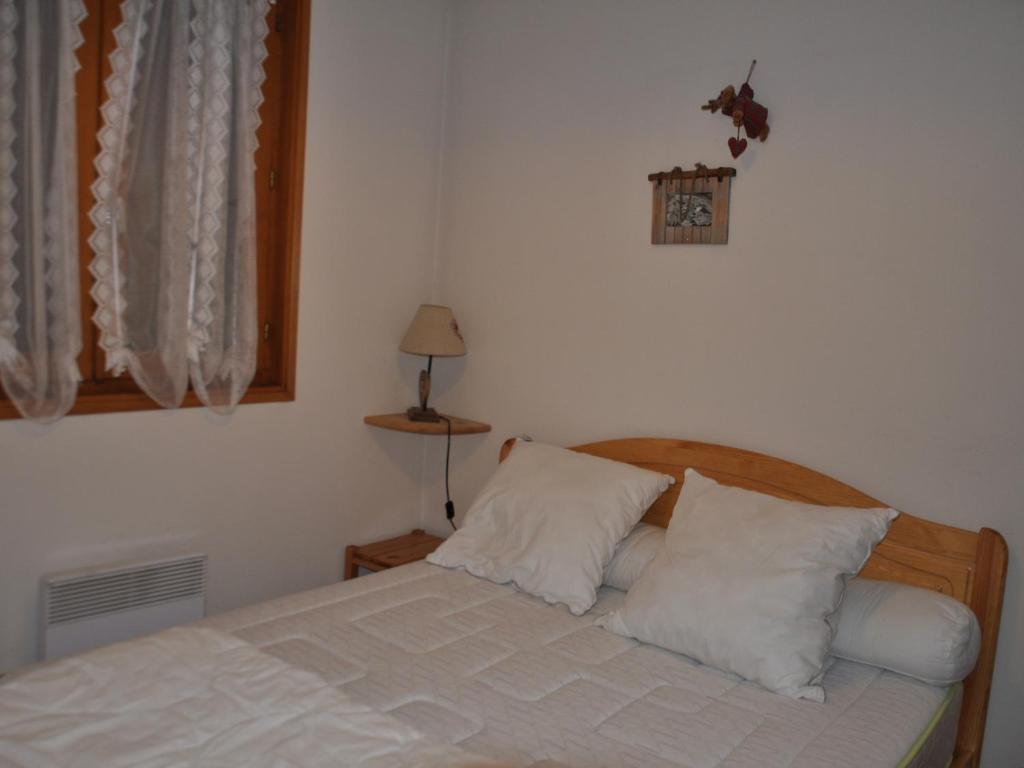 Posteľ alebo postele v izbe v ubytovaní Appartement cosy à 200m des pistes du Linga, balcon sud, parking inclus ! - FR-1-693-47