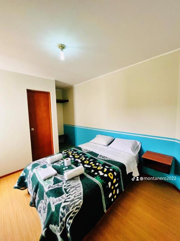 Postel nebo postele na pokoji v ubytování Montañero Hostel