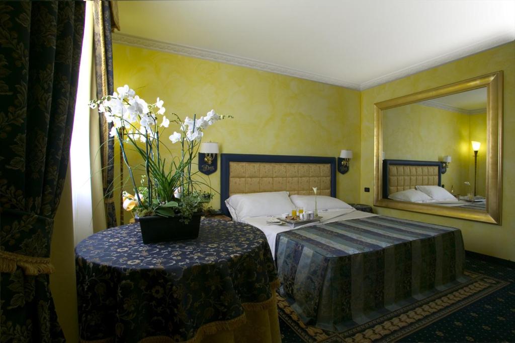Postel nebo postele na pokoji v ubytování Hotel Motel Del Duca