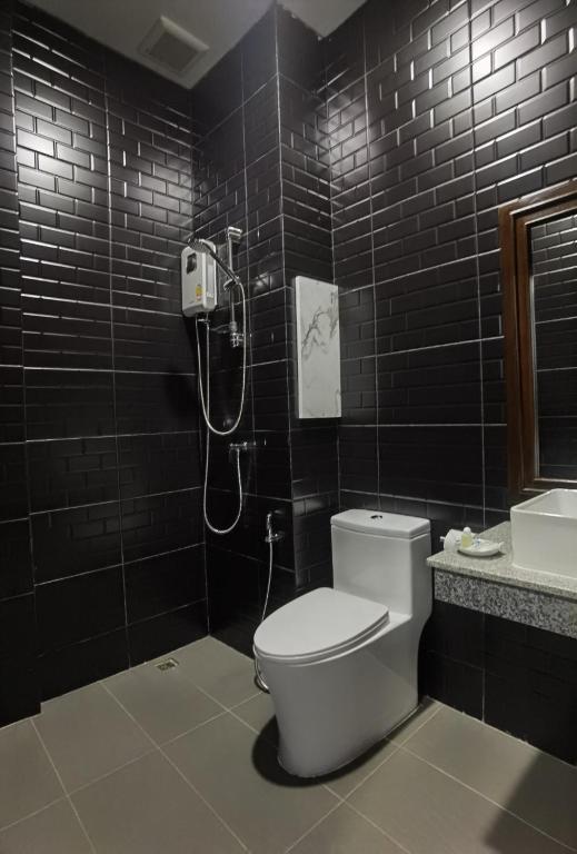 Koupelna v ubytování โรงแรมชลาลัย กระบี่ Chalalai Hotel Krabi
