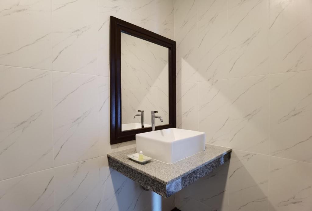 Koupelna v ubytování โรงแรมชลาลัย กระบี่ Chalalai Hotel Krabi