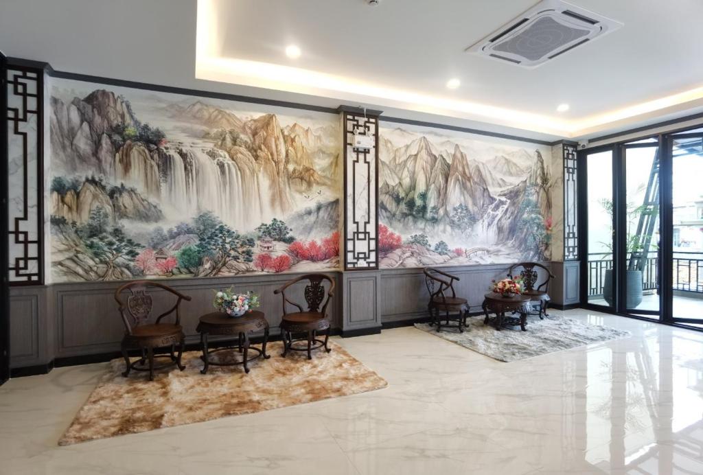 Posezení v ubytování โรงแรมชลาลัย กระบี่ Chalalai Hotel Krabi