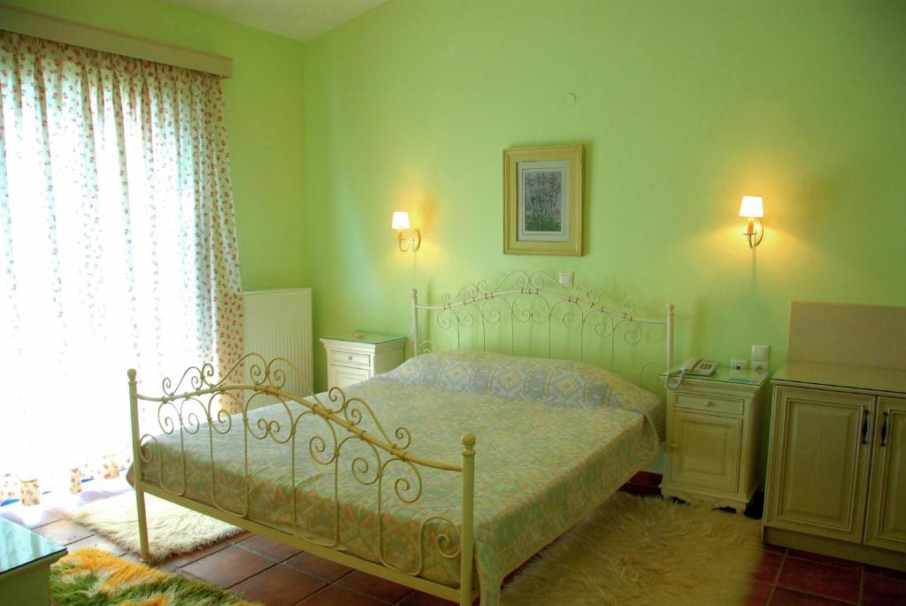 Postel nebo postele na pokoji v ubytování Agnadi Hotel