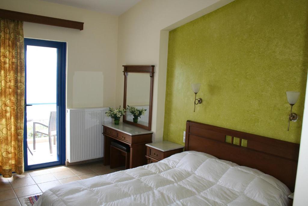 Postel nebo postele na pokoji v ubytování Agnadi Hotel