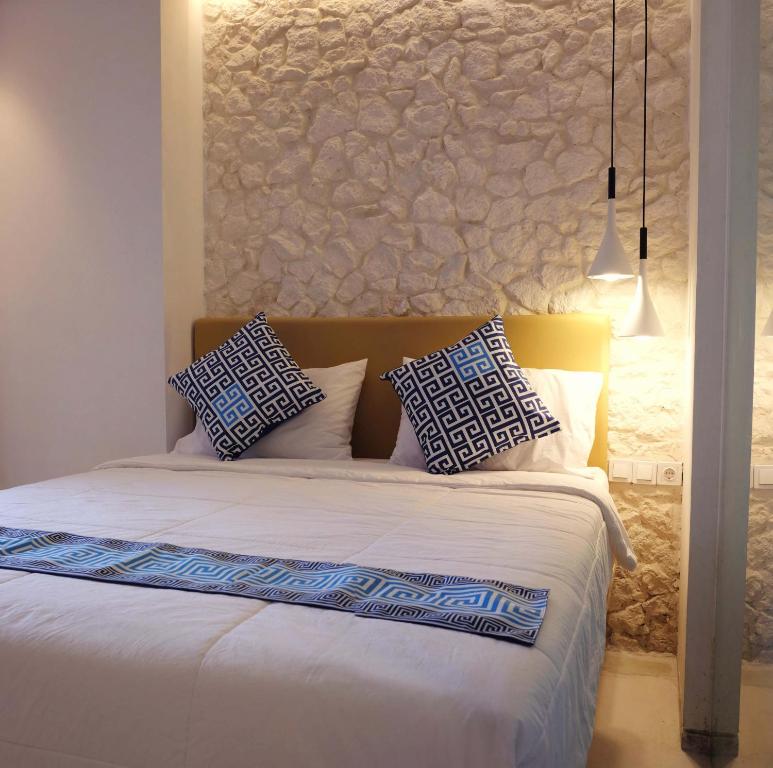 Postel nebo postele na pokoji v ubytování Little Mykonos