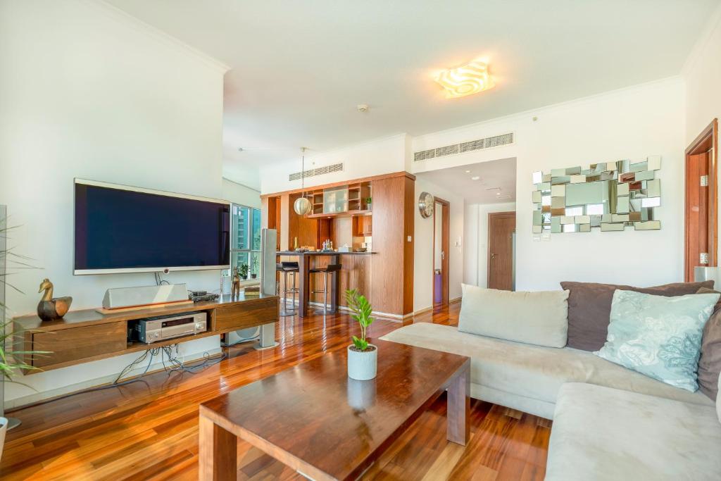 TV a/nebo společenská místnost v ubytování Burj Residences T3 Premium Apartment