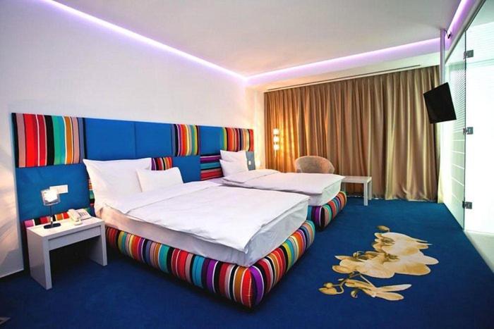Postel nebo postele na pokoji v ubytování Marshal Garden Hotel