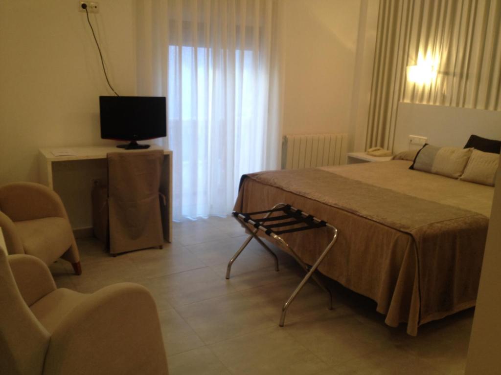 TV a/nebo společenská místnost v ubytování Hotel Felix