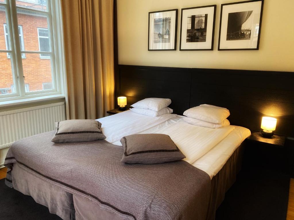Postel nebo postele na pokoji v ubytování Hotel Villan