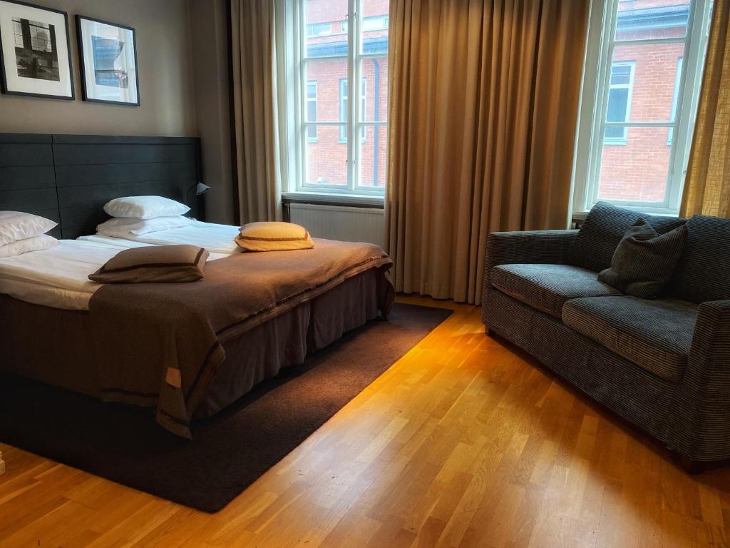 Postel nebo postele na pokoji v ubytování Hotel Villan