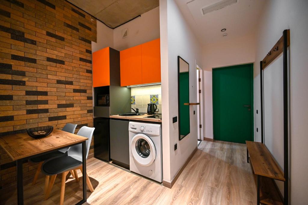Kuchyň nebo kuchyňský kout v ubytování Rooms Apart-Hotel by RED