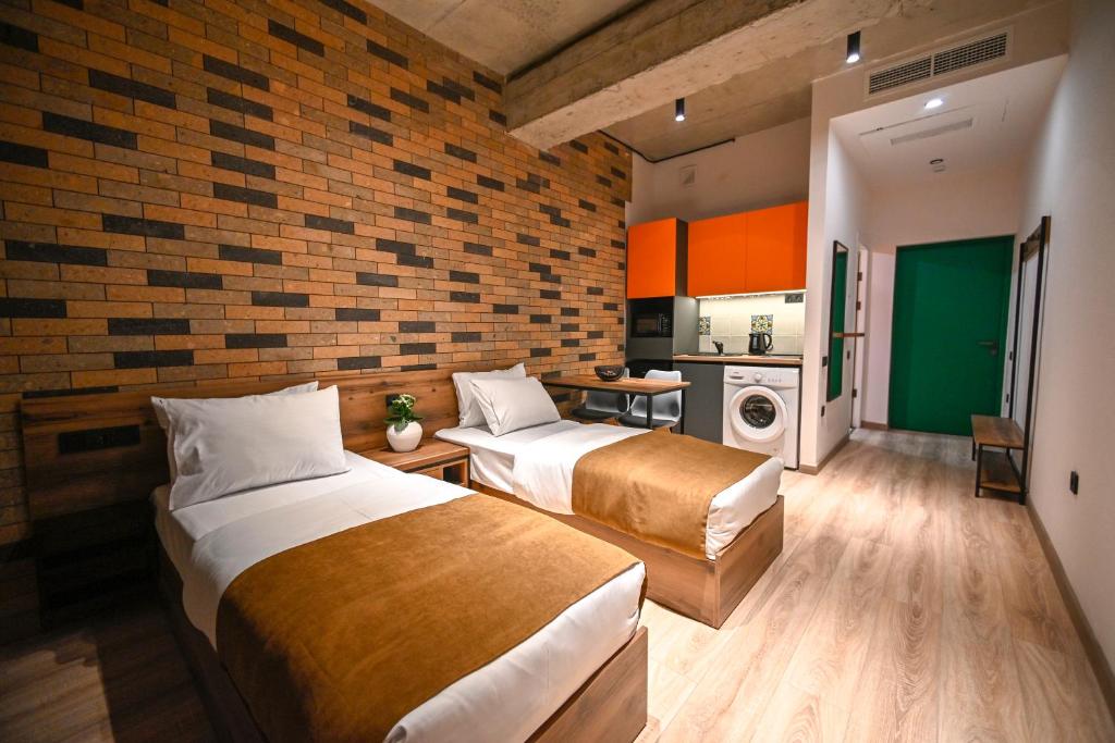 Postel nebo postele na pokoji v ubytování Rooms Apart-Hotel by RED