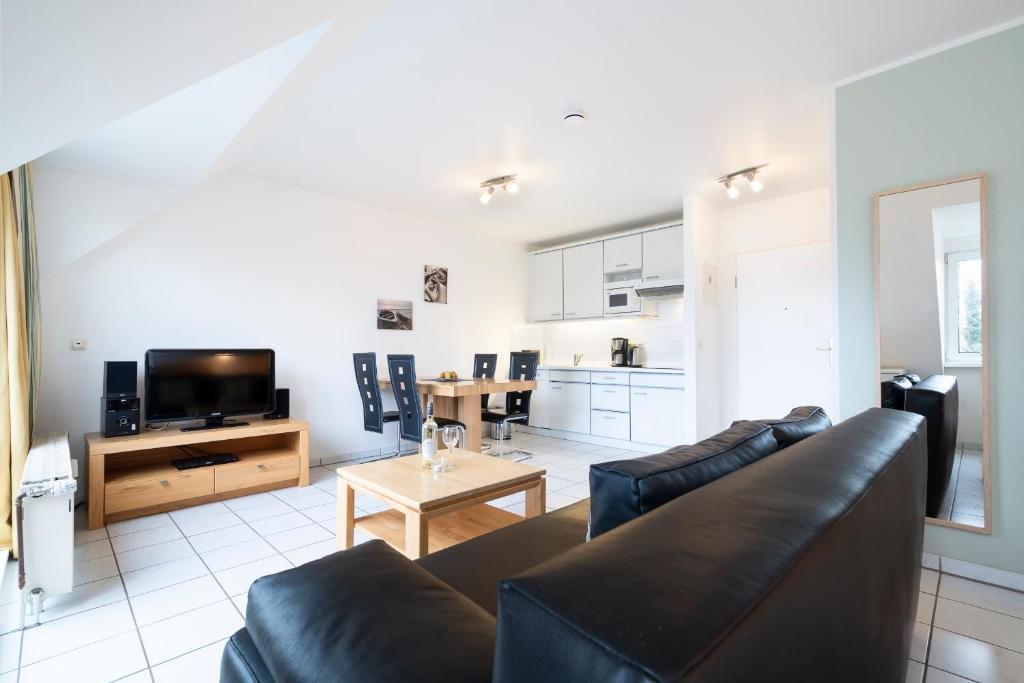 Kuchyň nebo kuchyňský kout v ubytování Wohnpark am Mühlenteich - Appartement 24