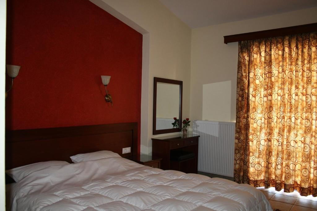 Postel nebo postele na pokoji v ubytování Agnadi Hotel