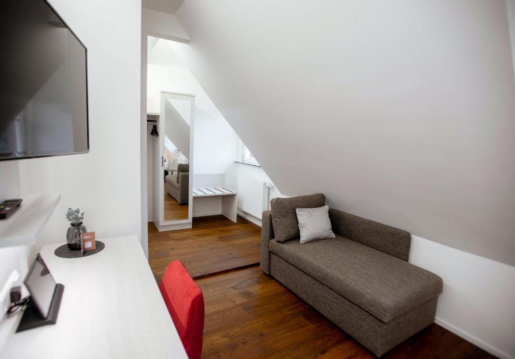 TV a/nebo společenská místnost v ubytování Reos Hotel Wangen