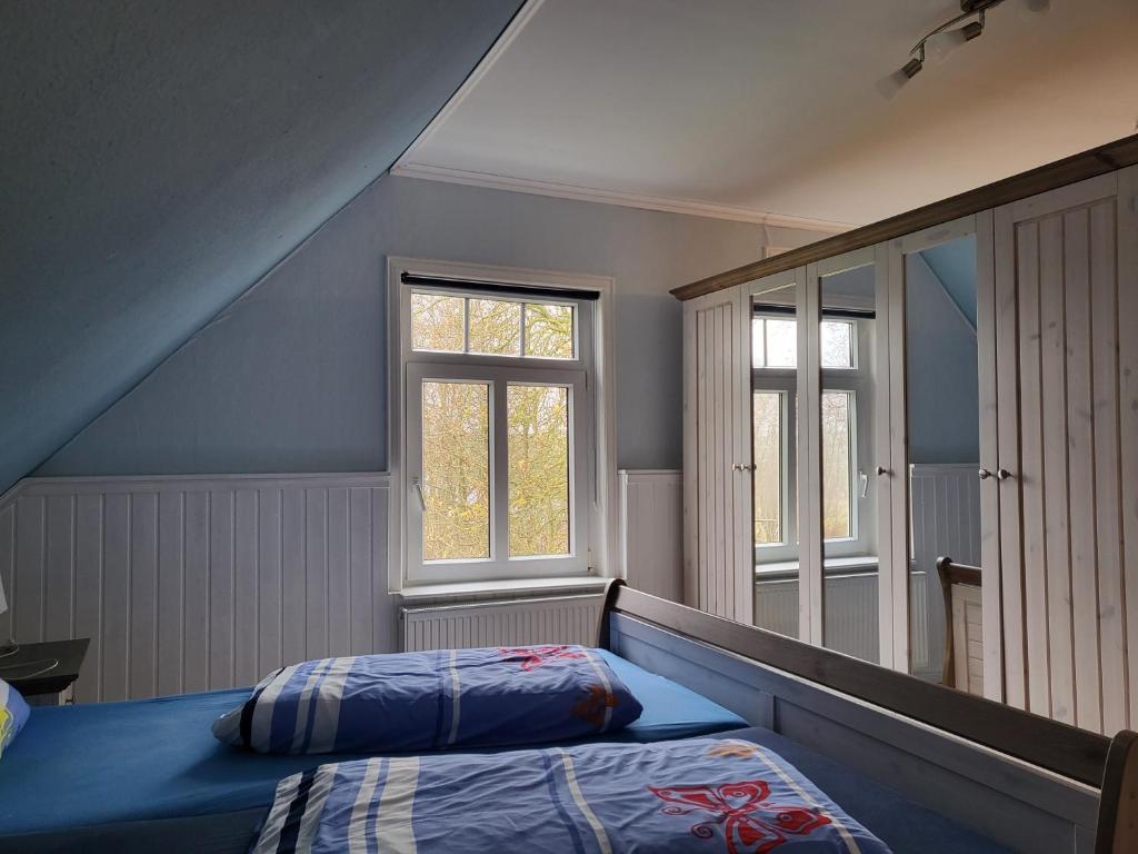 Urlaub im blauen Haus - One-Bedroom Apartment