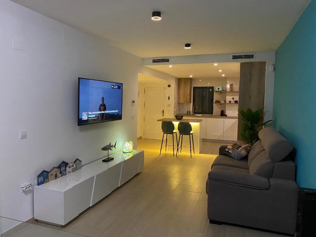 TV a/nebo společenská místnost v ubytování El Capricho de Poniente - Torre Dos Calas