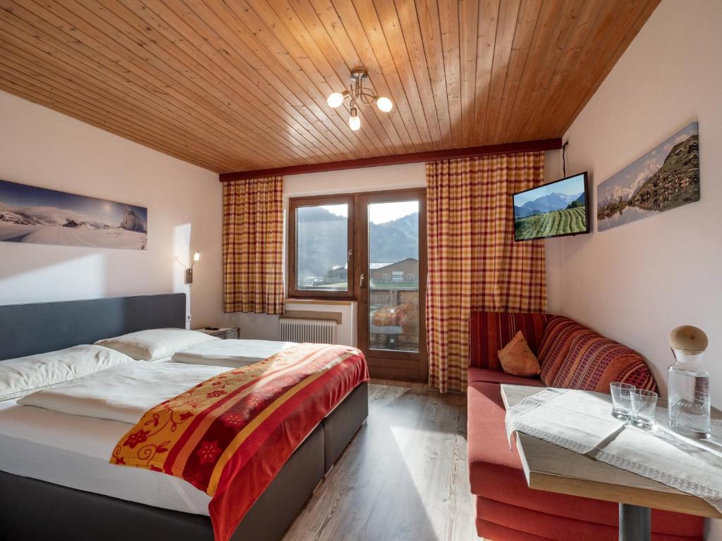 Postel nebo postele na pokoji v ubytování Landhaus Elfi