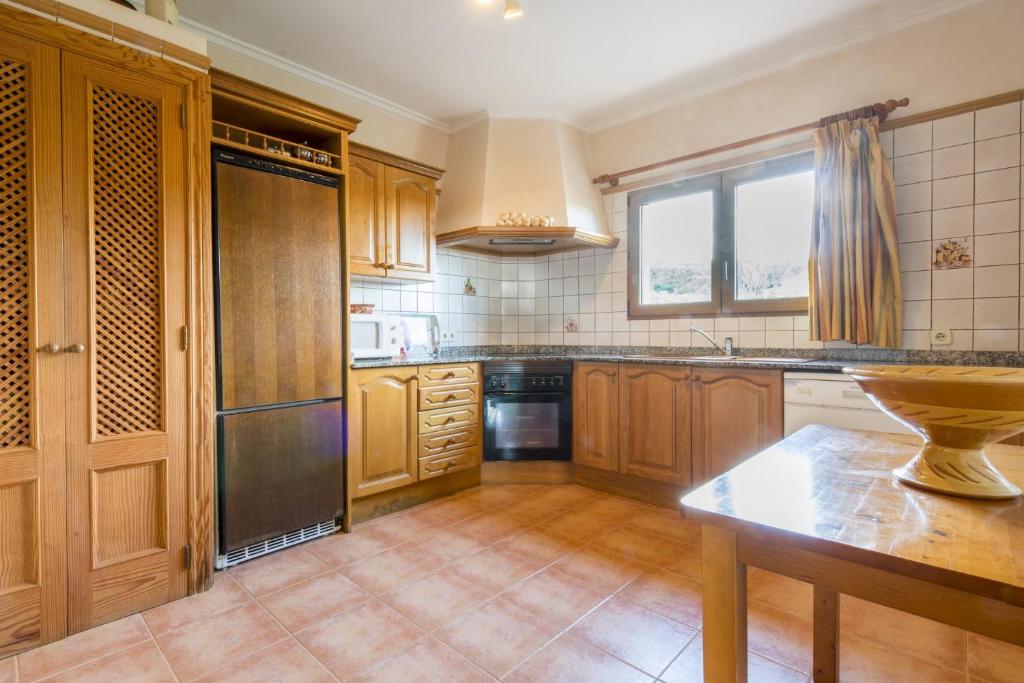 A kitchen or kitchenette at Finca Es Reguerons Petit