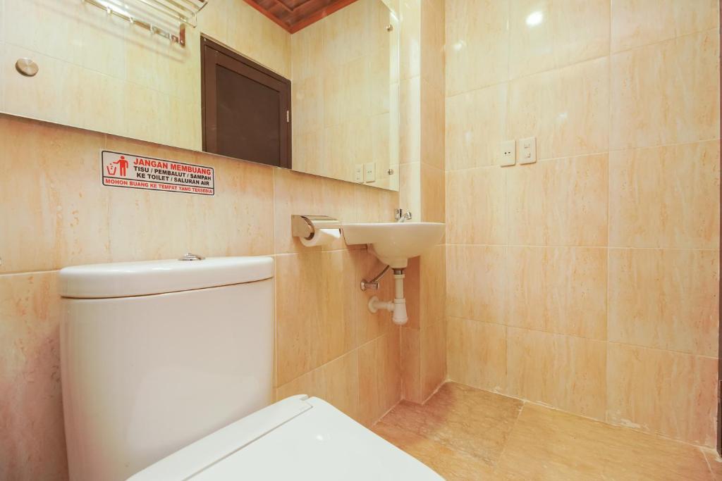 Koupelna v ubytování Urbanview Hotel Cantee Halim Perdanakusuma by RedDoorz