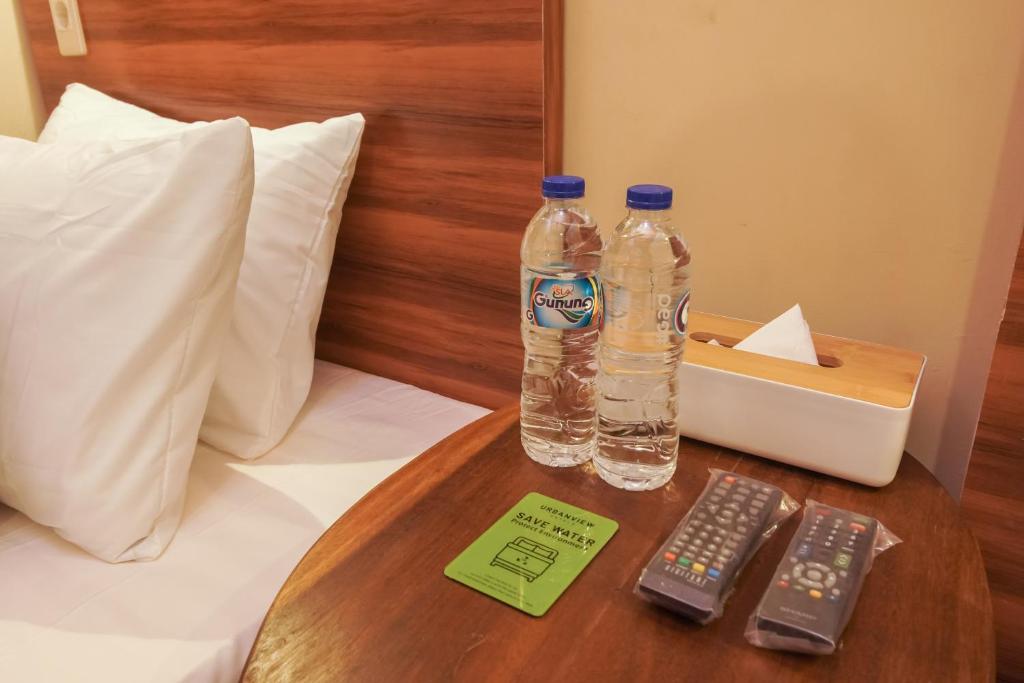 Postel nebo postele na pokoji v ubytování Urbanview Hotel Cantee Halim Perdanakusuma by RedDoorz