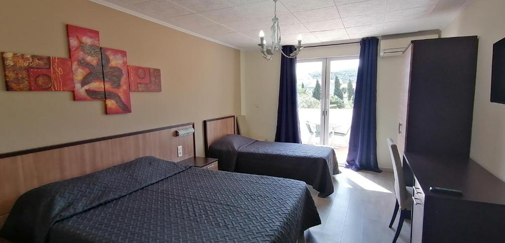 Postel nebo postele na pokoji v ubytování U Libecciu