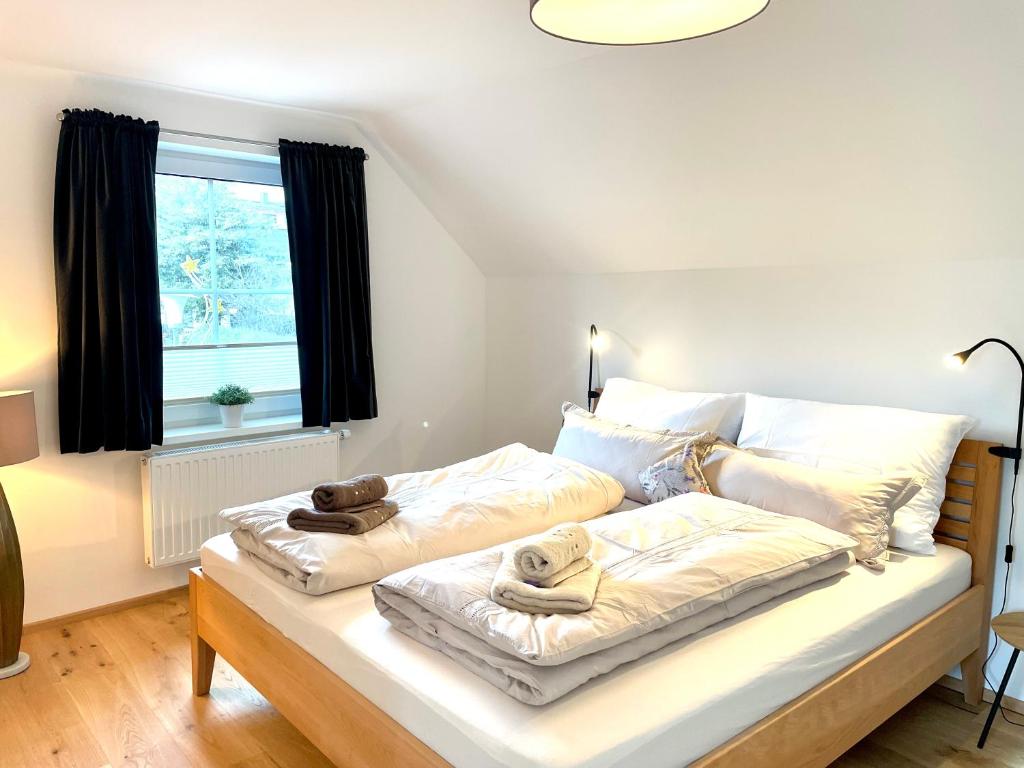 Postel nebo postele na pokoji v ubytování Appartements BERGTRAUM