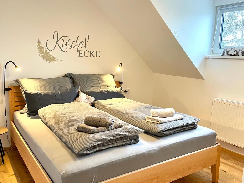 Postel nebo postele na pokoji v ubytování Appartements BERGTRAUM