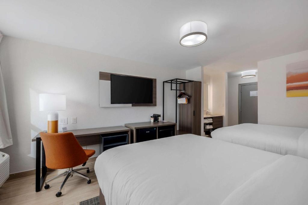 Postel nebo postele na pokoji v ubytování Comfort Inn