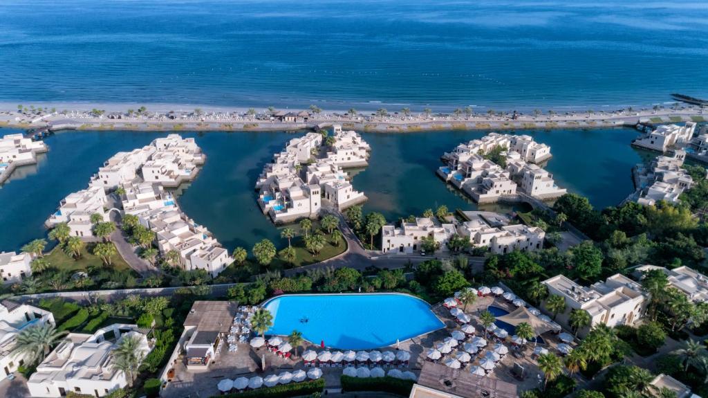 an aerial view of the marina at a resort at The Cove Rotana Resort - Ras Al Khaimah in Ras al Khaimah