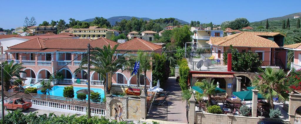 an aerial view of a resort with a swimming pool at Eugenia Hotel & Apartments in Laganas