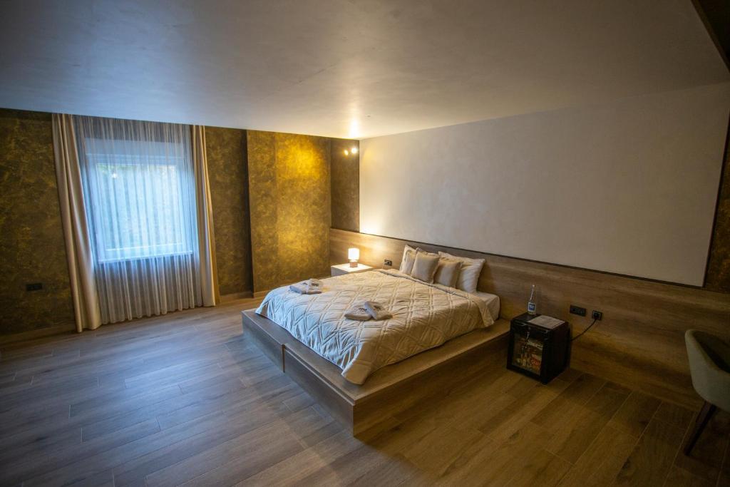 Postel nebo postele na pokoji v ubytování Monogramlux