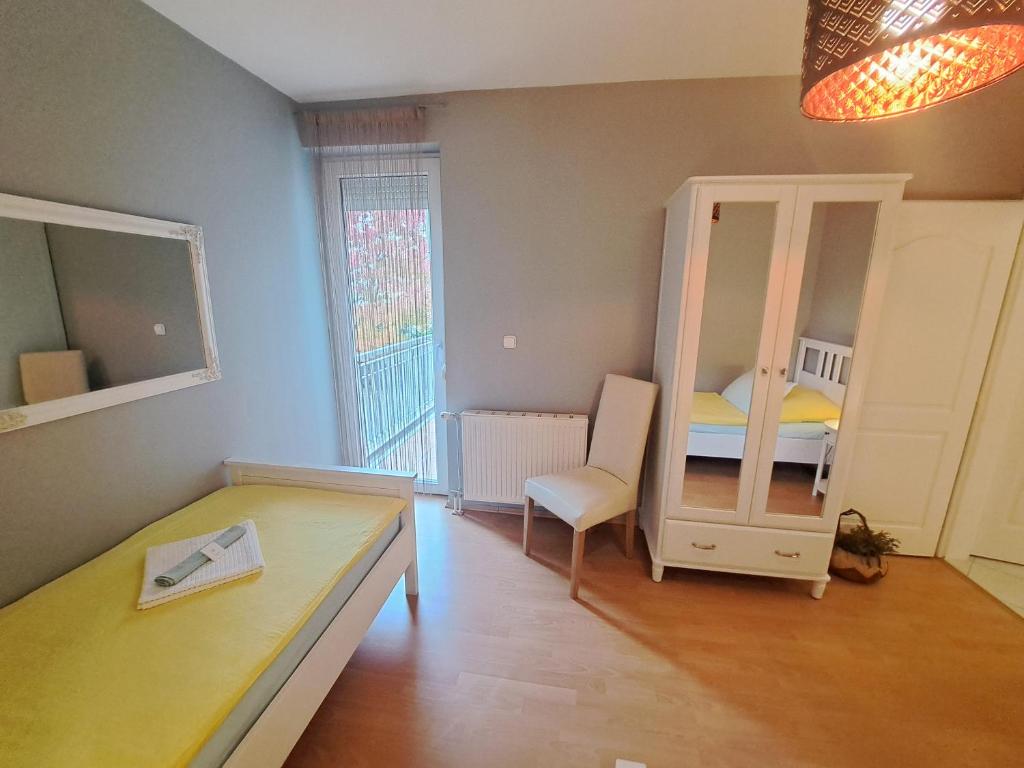 Posteľ alebo postele v izbe v ubytovaní Bella Golden Beach Siófok