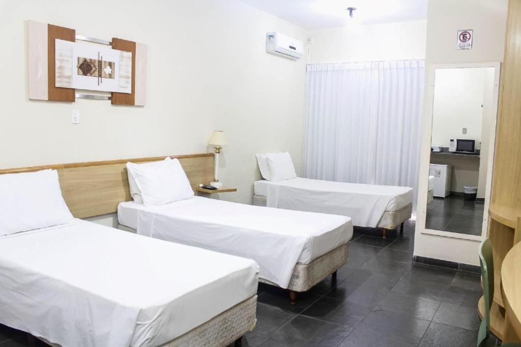 Bravo Suites São Carlos - Dreifacher Raum