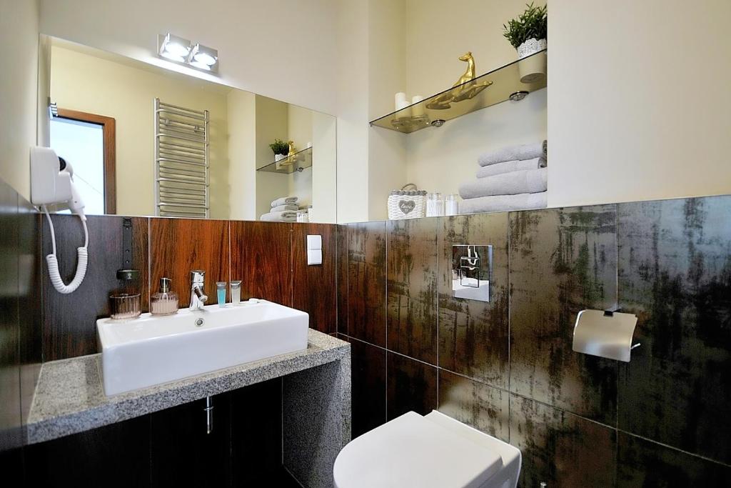 Kúpeľňa v ubytovaní 408 w ROYAL TULIP SAND 200 m plaża prywatny DOBRUK APARTAMENTY