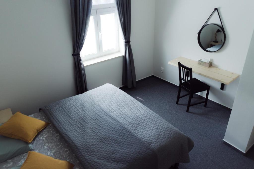 Posteľ alebo postele v izbe v ubytovaní Treehouse Apartments