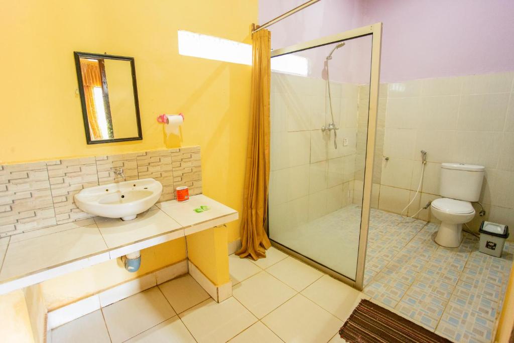 Koupelna v ubytování Pondok Guru Bakti Cottage