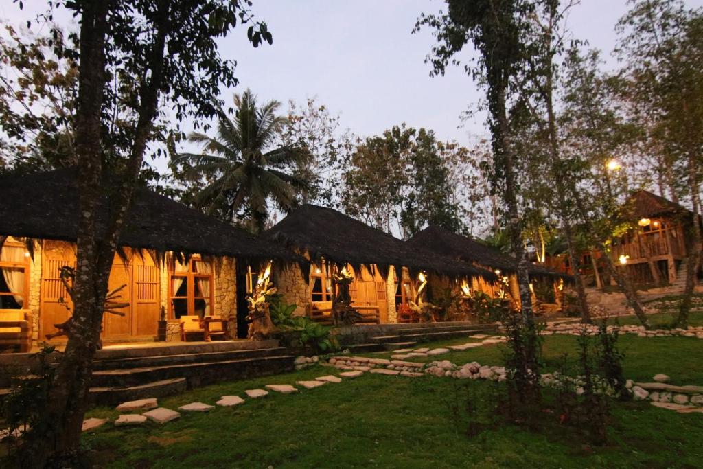 a resort with a building with lights on it at Rajaklana Resort and Spa in Bantul