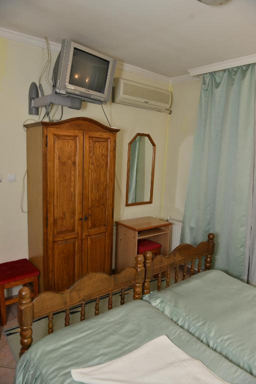 Postel nebo postele na pokoji v ubytování Sneža