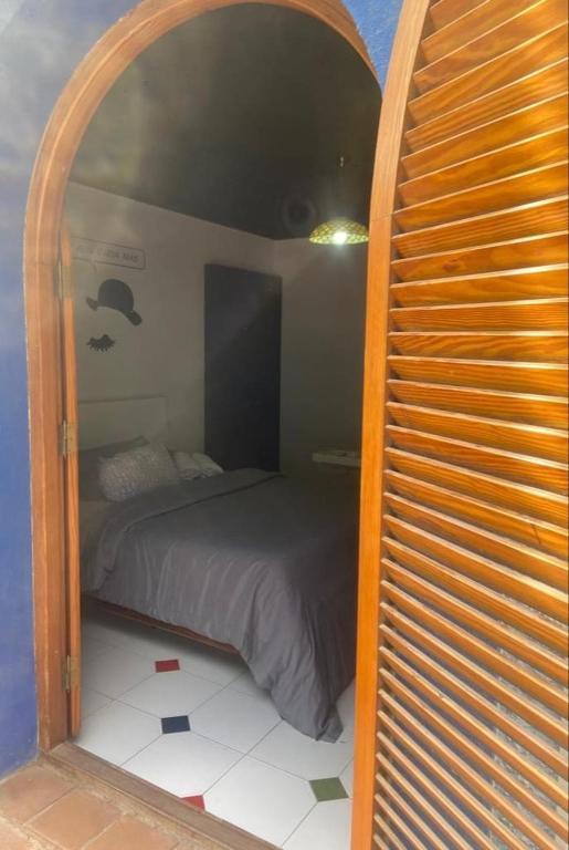 Postel nebo postele na pokoji v ubytování 16:9 Los Molinos Suites