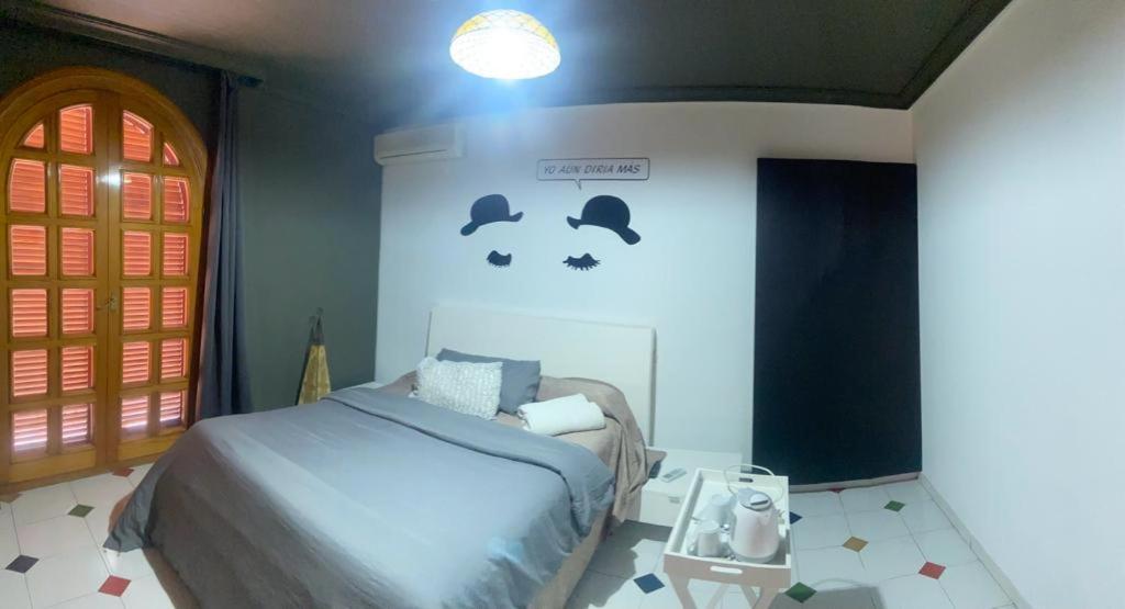 Postel nebo postele na pokoji v ubytování 16:9 Los Molinos Suites