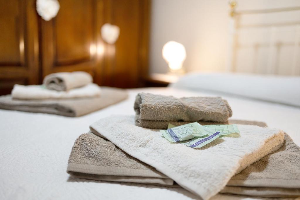 Postel nebo postele na pokoji v ubytování Agriturismo U'Spigu Nonna Annetta
