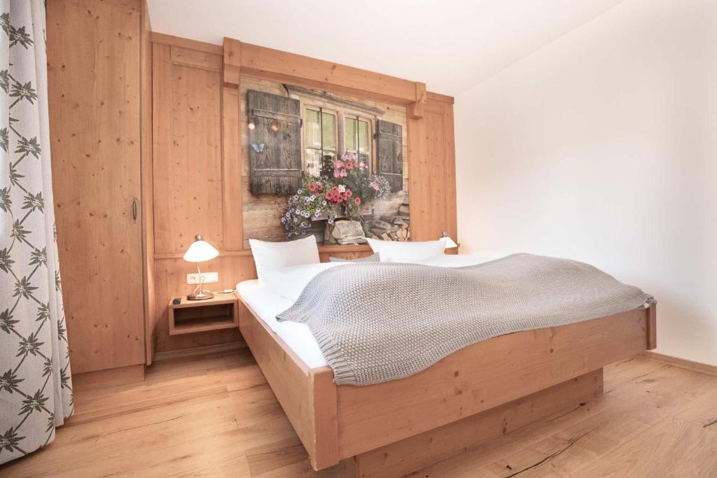Postel nebo postele na pokoji v ubytování Hotel-Gasthof Der Wiesengrund