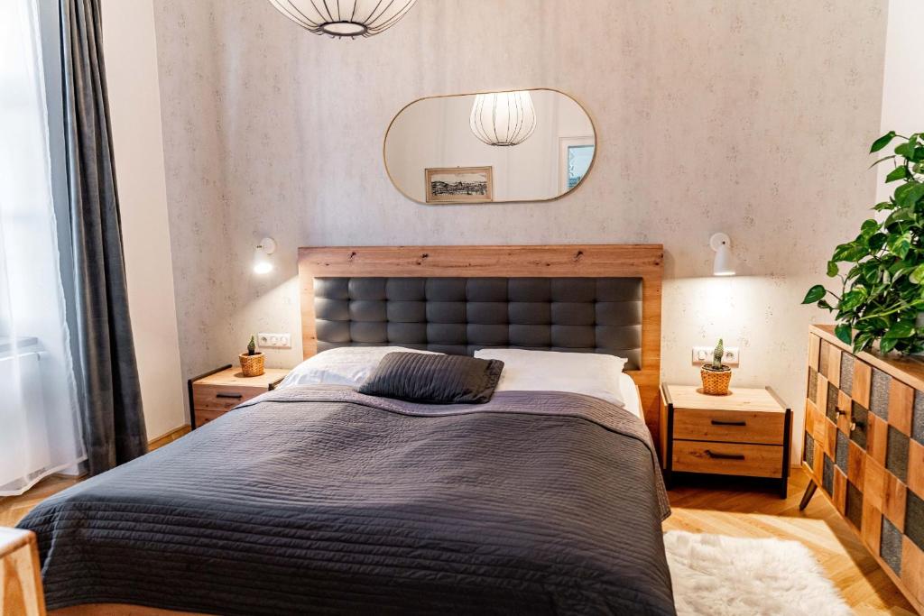 Postel nebo postele na pokoji v ubytování Apartmány Marienhof