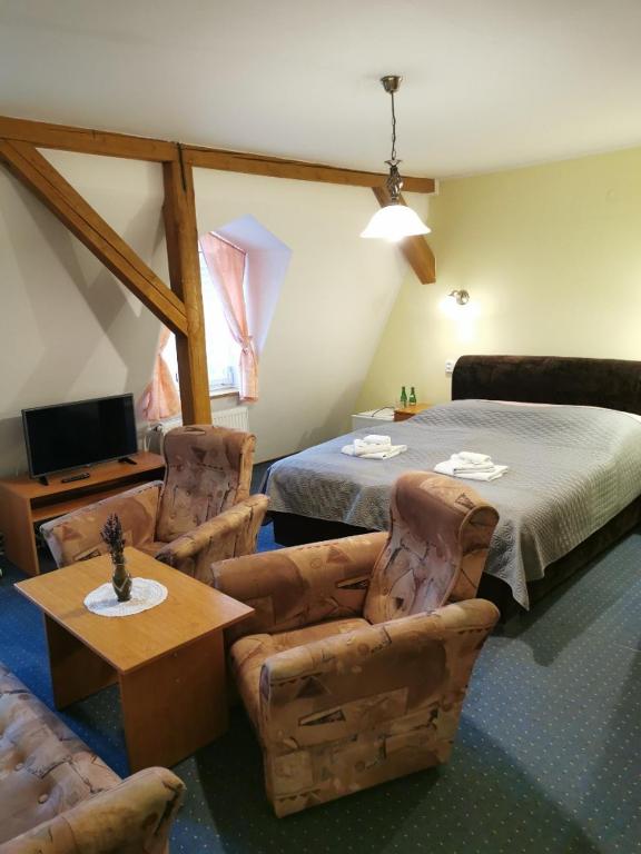 Postel nebo postele na pokoji v ubytování Hotel Alster
